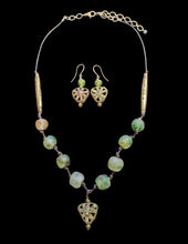 african glass & brass set