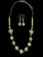 long african brass & glass set