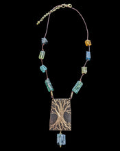 bronze tree & roman glass set