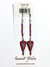 carved heart & crystals earrings